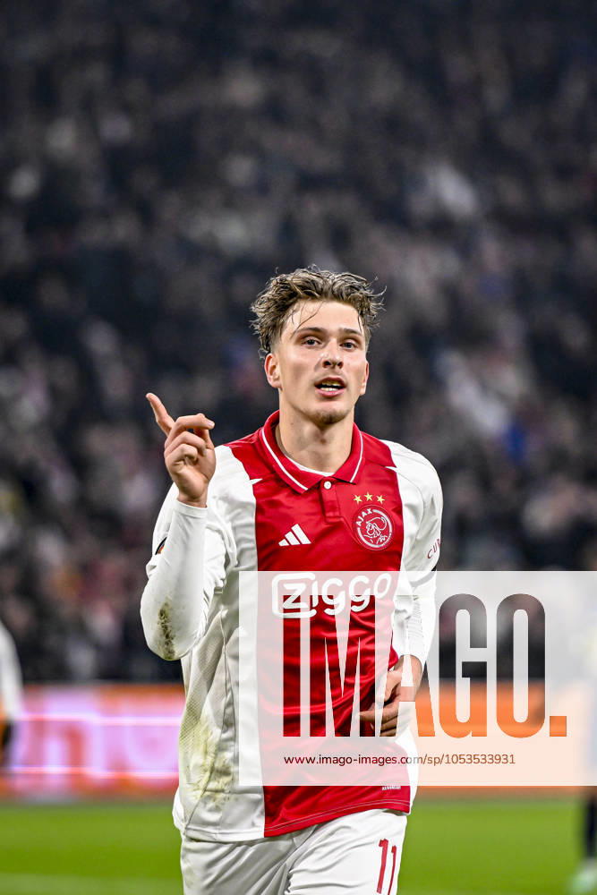 AFC Ajax Amsterdam forwarder Mika Godts celebrating the goal 3-0, during the match Ajax - Maccabi Tel Aviv at the Johan Cruijff ArenA for the UEFA Europa League - League phase - Matchday 4 season 2024-2025 in AMSTERDAM, Netherlands on 7 november 2024, (photo by Stefan Koops EYE4images DeFodi Images) not used in POL SRB CRO FRA GBR NED ITA USA Defodi-746_198838