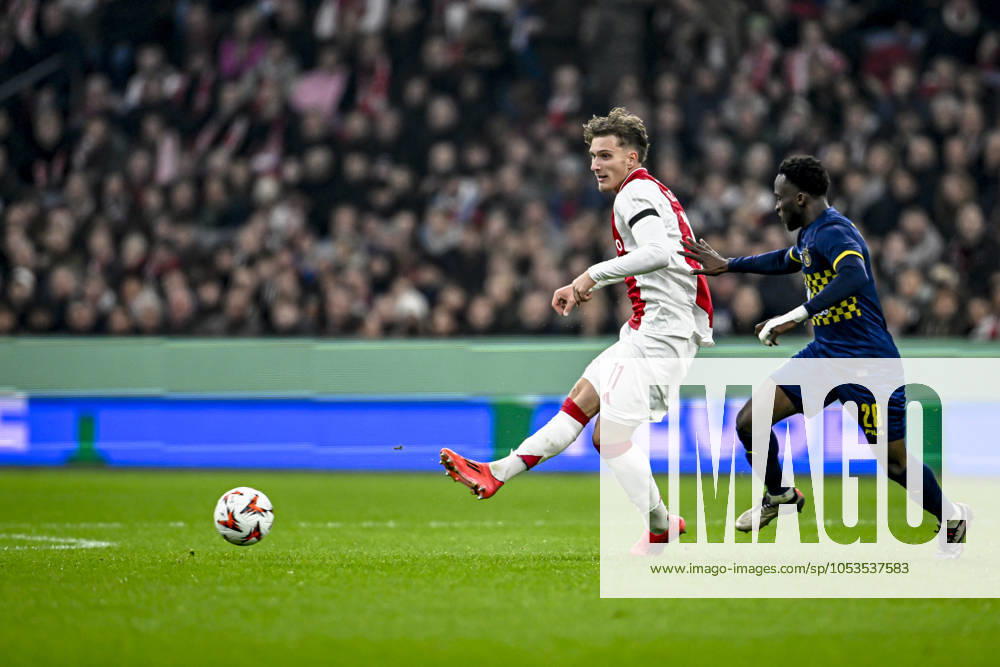 AFC Ajax Amsterdam forwarder Mika Godts, during the match Ajax - Maccabi Tel Aviv at the Johan Cruijff ArenA for the UEFA Europa League - League phase - Matchday 4 season 2024-2025 in AMSTERDAM, Netherlands on 7 november 2024, (photo by Stefan Koops EYE4images DeFodi Images) not used in POL SRB CRO FRA GBR NED ITA USA Defodi-746_198879