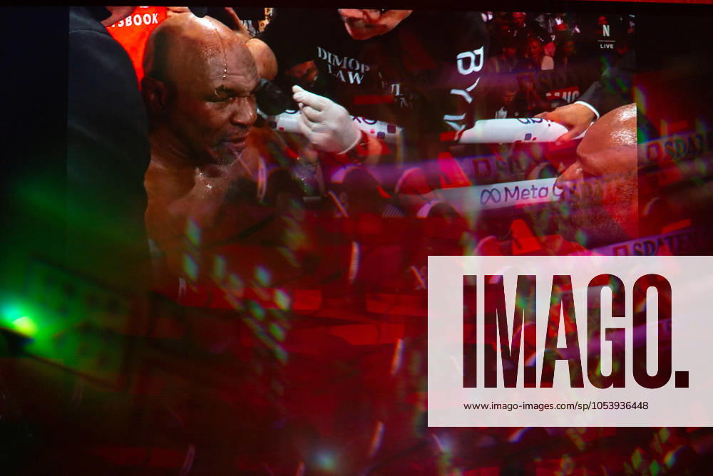Reflections of the Paul, Tyson fight as viewed online presented by Netflix. Jake Paul wins the fight against Mike Tyson by unanimous decision after a full eight-round heavyweight match in AT&T Stadium in front of 70,000 fans on Friday. Hosted onine by Netflix with an estimated tens of millions of viewers. Manhattan USA - ZUMAt152 20241116_znp_t152_014