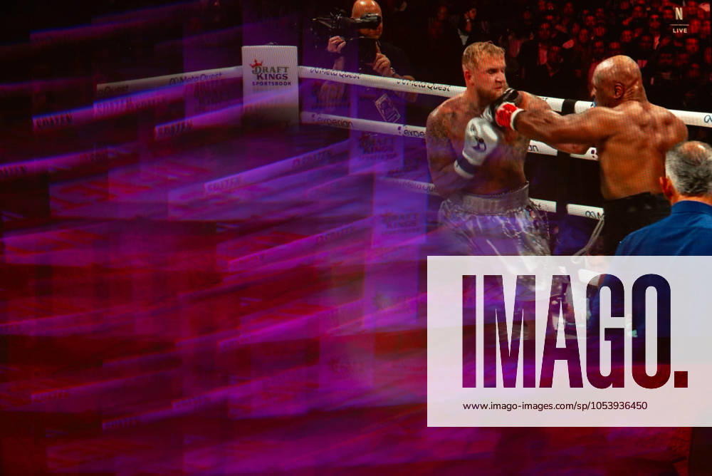 Reflections of the Paul, Tyson fight as viewed online presented by Netflix. Jake Paul wins the fight against Mike Tyson by unanimous decision after a full eight-round heavyweight match in AT&T Stadium in front of 70,000 fans on Friday. Hosted onine by Netflix with an estimated tens of millions of viewers. Manhattan USA - ZUMAt152 20241116_znp_t152_015