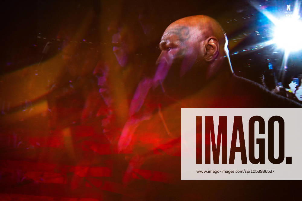 Reflections of the Paul, Tyson fight as viewed online presented by Netflix. Jake Paul wins the fight against Mike Tyson by unanimous decision after a full eight-round heavyweight match in AT&T Stadium in front of 70,000 fans on Friday. Hosted onine by Netflix with an estimated tens of millions of viewers. Manhattan USA - ZUMAt152 20241116_znp_t152_004