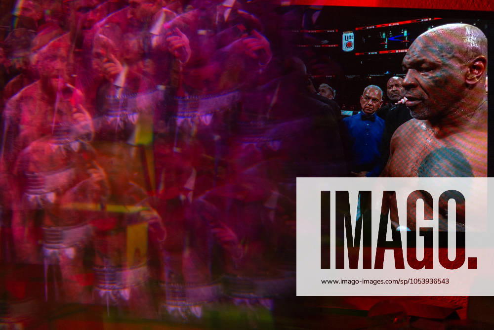 Reflections of the Paul, Tyson fight as viewed online presented by Netflix. Jake Paul wins the fight against Mike Tyson by unanimous decision after a full eight-round heavyweight match in AT&T Stadium in front of 70,000 fans on Friday. Hosted onine by Netflix with an estimated tens of millions of viewers. Manhattan USA - ZUMAt152 20241116_znp_t152_026