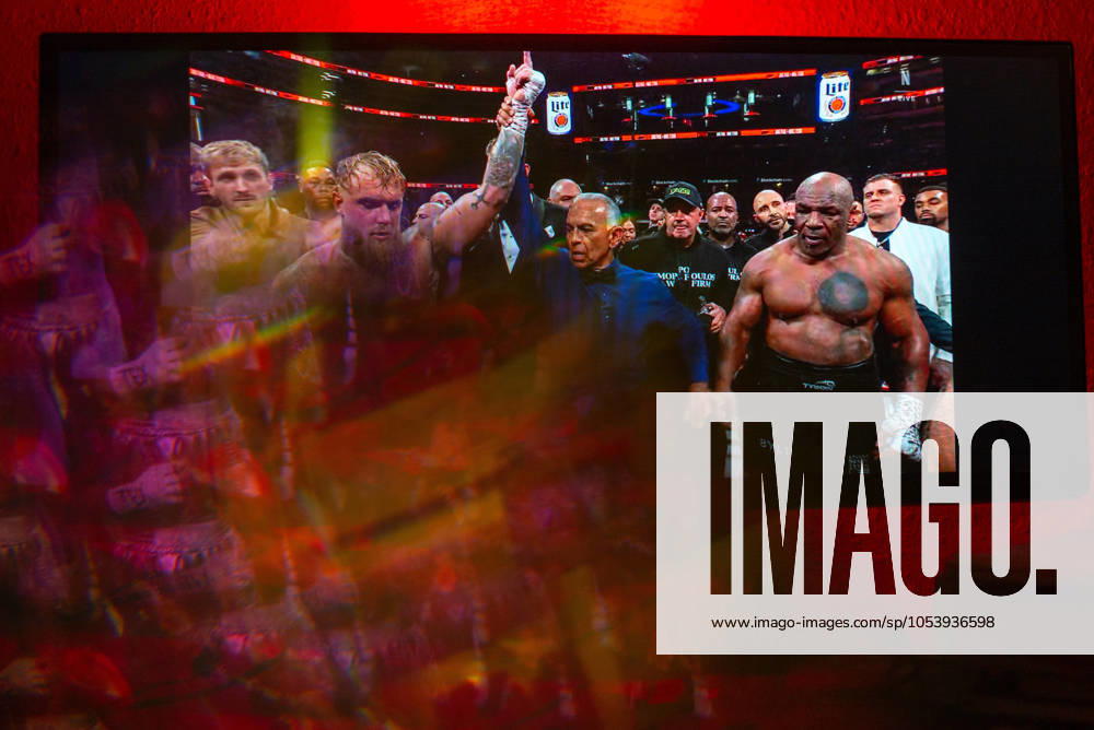 Reflections of the Paul, Tyson fight as viewed online presented by Netflix. Jake Paul wins the fight against Mike Tyson by unanimous decision after a full eight-round heavyweight match in AT&T Stadium in front of 70,000 fans on Friday. Hosted onine by Netflix with an estimated tens of millions of viewers. Manhattan USA - ZUMAt152 20241116_znp_t152_024