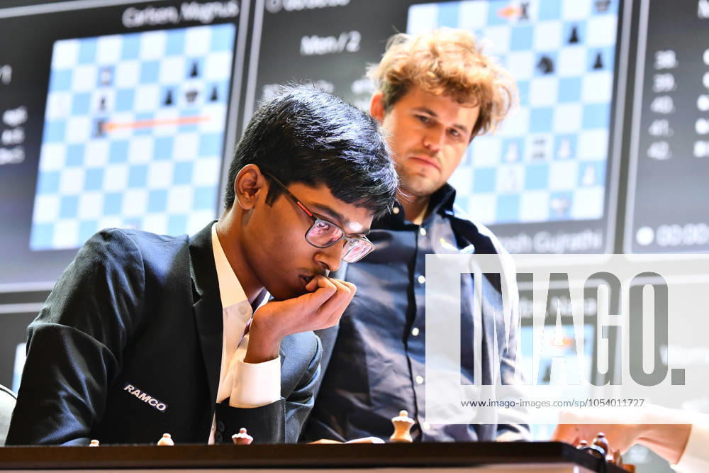 Final Day Of TATA STEEL CHESS INDIA Rapid & Blitz Tournament Indian GM Rameshbabu Praggnanandhaa plays against Indian GM Vidit Gujrathi (not visible in frame) while Norway s GM Magnus Carlsen observes during the Blitz round chess at the 6th TATA Steel Chess India Tournament in Kolkata, India, on November 17, 2024, at Dhono Dhanyo Auditorium. KOLKATA India