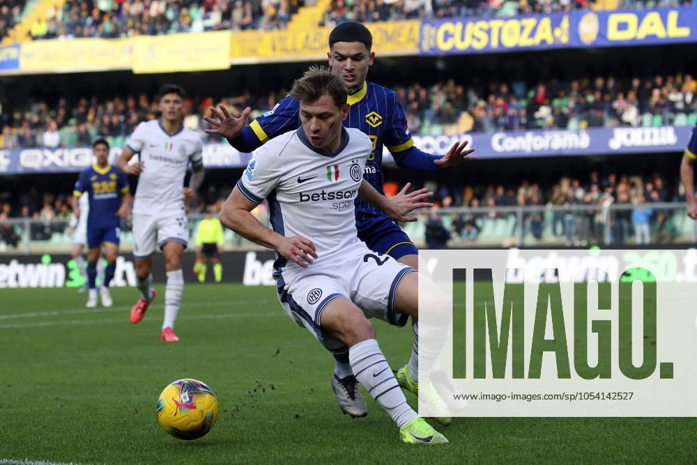 Inter Milan s Nicolo Barella Verona s Reda Belahyane during the Serie A soccer match between Hellas Verona and Inter at the Marcantonio Bentegodi Stadium, north Est Italy - Saturday, November 23, 2024. - Soccer