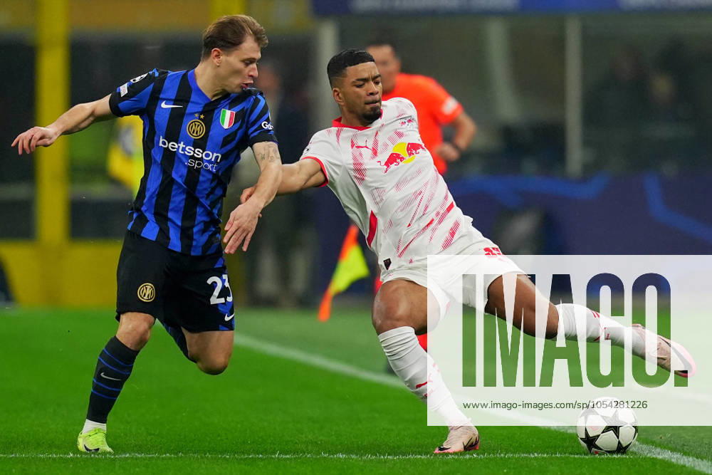 Inter Milan s Nicolo Barella fights for the ball with Leipzig s Benjamin Henrichs during the Uefa Champions League soccer match between Inter and Leipzig at the San Siro Stadium in Milan, north Italy - Tuesday , November 26 , 2024. - Soccer .