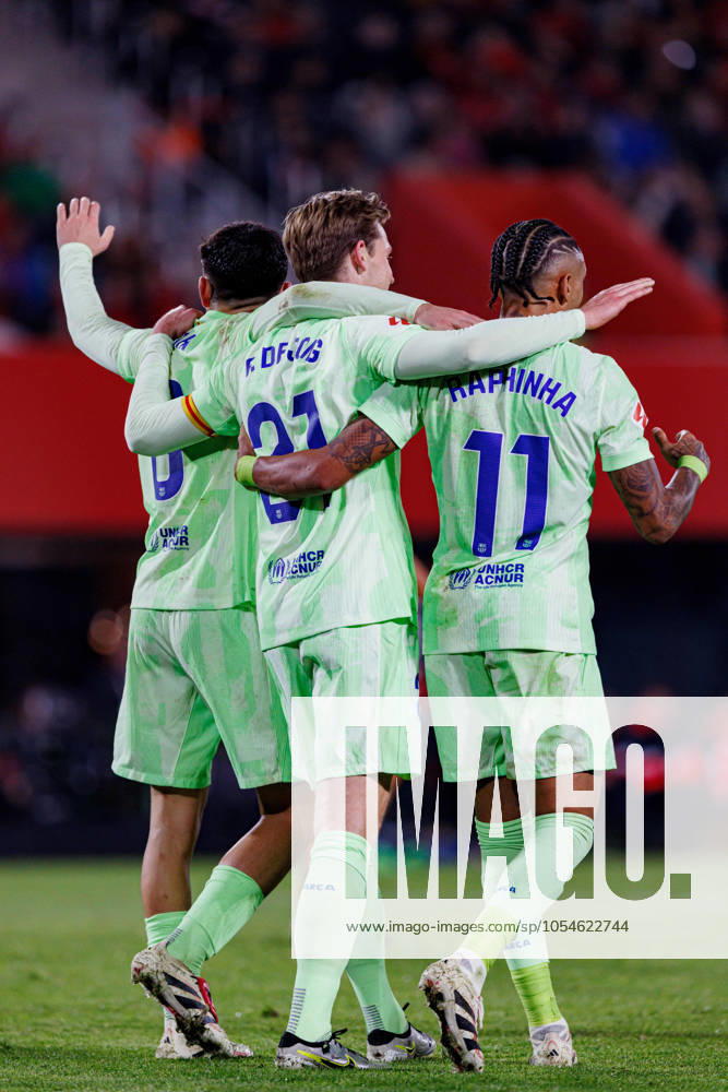 Frenkie De Jong, Raphinha, Pedri FC Barcelona, Barca celebrate after scoring a goal during the LaLiga EA SPORTS game between RCD Mallorca and FC Barcelona at Estadi Mallorca Son Moix. Final scores RCD Mallorca 1-5 FC Barcelona. Palma De Mallorca Spain - ZUMAs197 20241203_aaa_s197_431