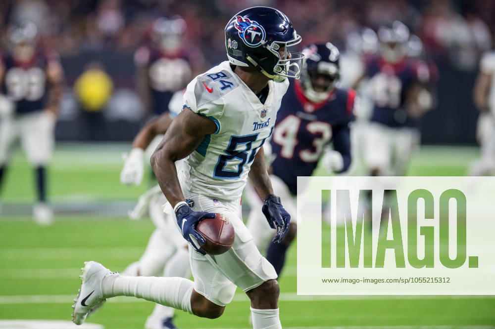 NFL, American Football Herren, USA 2018: Titans vs Texans NOV 26 November 26, 2018: Tennessee Titans wide receiver Corey Davis (84) runs for a touchdown after making a catch during the 3rd quarter of an NFL football game between the Tennessee Titans and the Houston Texans at NRG Stadium in Houston, TX. The Texans won the game 34 to 17...Trask Smith CSM Houston TX U.S.