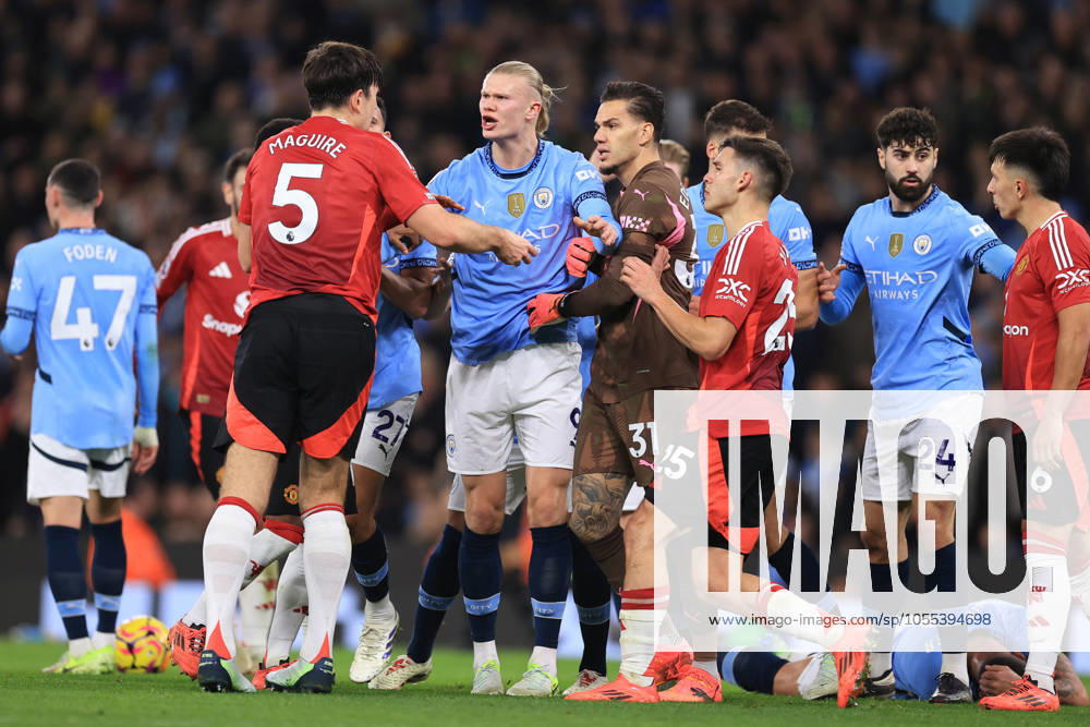 Manchester City v Manchester United, ManU 15 December 2024 - Premier League - Manchester City v Manchester United - Kyle Walker of Manchester City lies on the floor as rival players Erling Haaland of Manchester City and Harry Maguire of Manchester United scuffle around him - Photo: Simon Stacpoole Offside. Manchester UK