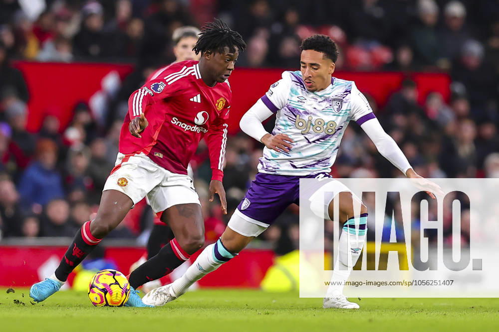 Manchester United, ManU FC v AFC Bournemouth Kobbie Mainoo of Manchester United looks for options during the Manchester United FC v AFC Bournemouth English Premier League match at Old Trafford, Manchester, England, United Kingdom on 22 December 2024 Editorial use only. All images are copyright Every Second Media Limited. No images may be reproduced without prior permission. All rights reserved. Premier League and Football League images are subject to licensing agreements with Football DataCo Limited. see https: www.football-dataco.com