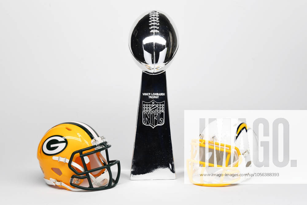 NFL, American Football Herren, USA Creative Detailed view of Green Bay Packers (left) and Los Angeles Chargers helmets and Super Bowl Vince Lombardi Trophy.