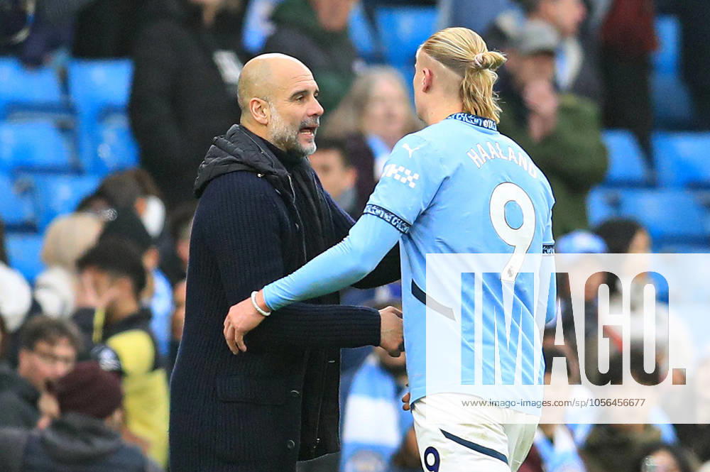 26th December 2024; Etihad Stadium, Manchester, England; Premier League Football, Manchester City versus Everton; Manchester City manager Pep Guardiola shakes hands with Erling Haaland of Manchester City as he is substituted ActionPlus12731066 DavidxBlunsden Content restricted for UK based newspaper