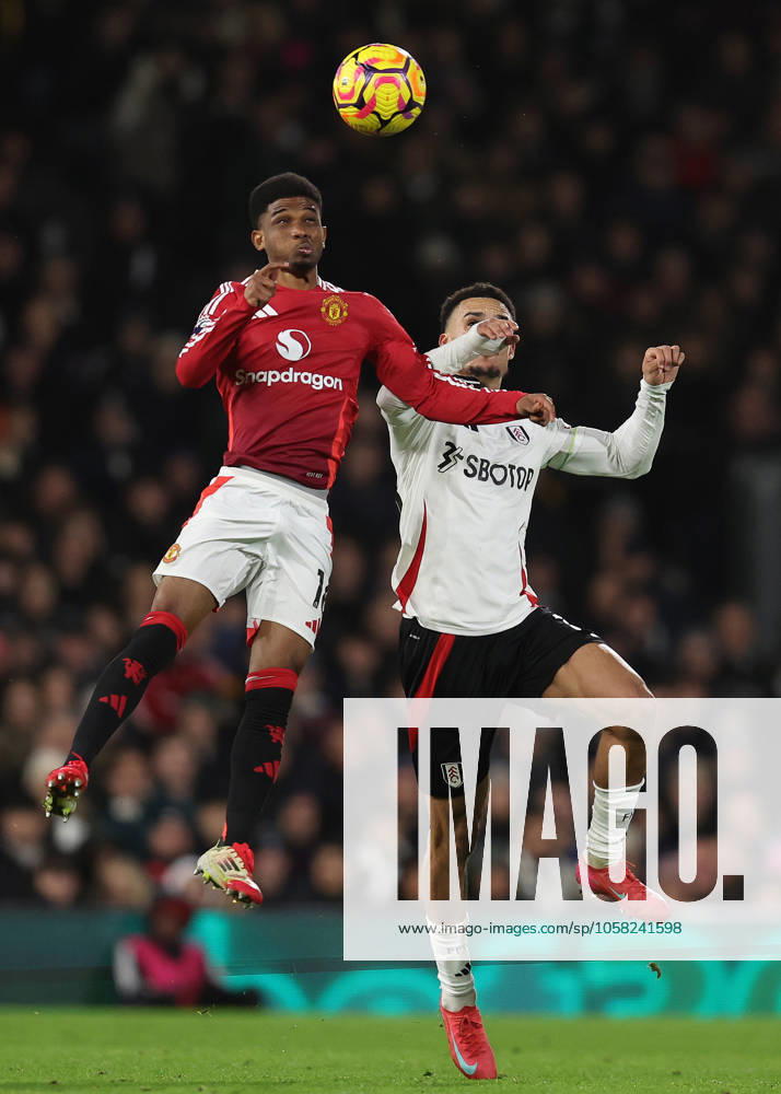 London, England, 26th January 2025. Amad Diallo of Manchester United, ManU and Antonee Robinson of Fulham challenge for the ball during the Premier League match at Craven Cottage, London. Picture credit should read: Paul Terry Sportimage . SPI_124_PT_Fulham_Man_Utd SPI-3632-0142