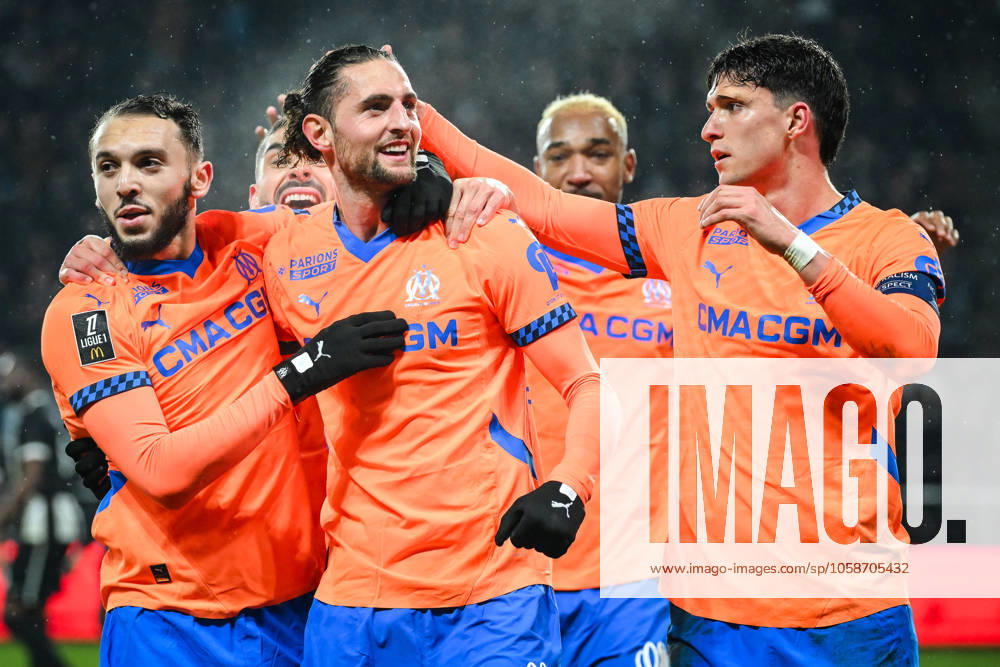 Adrien RABIOT of Marseille celebrate his goal with Amine GOUIRI of Marseille and Leonardo BALERDI of Marseille during the Ligue 1 match between Angers SCO and Olympique de Marseille (OM) at Raymond Kopa Stadium on February 09, 2025 in Angers, France. Angers France - ZUMAm308 20250209_zsp_m308_004