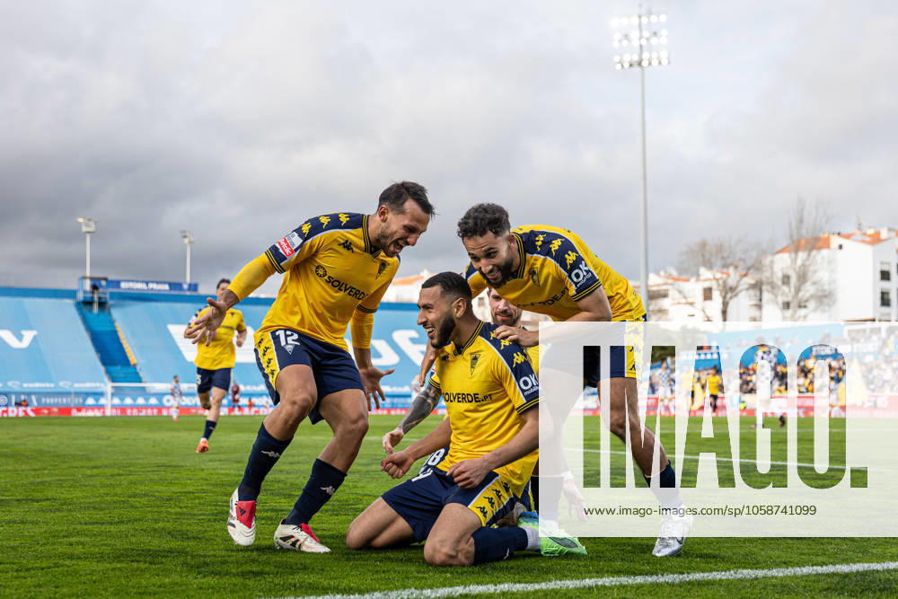 Yanis Begraoui of GD Estoril Praia celebrates with teammates; Joao Carvalho and Rafik Guitane after scoring a goal during the Liga Portugal Betclic match between Estoril Praia Futebol SAD and Boavista FC at Estadio Antonio Coimbra da Mota. Final score: Estoril Praia Futebol SAD 2 - 1 Boavista FC Cascais Portugal - ZUMAs197 20230130_aaa_s197_065