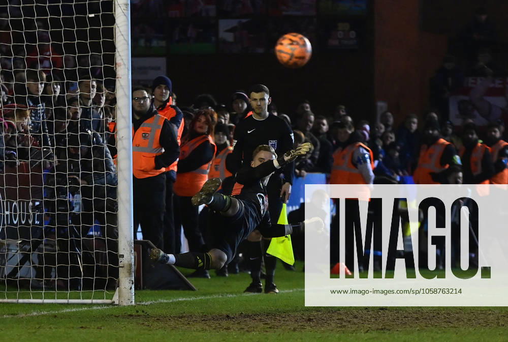 Exeter City v Nottingham Forest, Exeter, UK - 11 Feb 2025 Neco Williams of Nottingham Forest scores the winning penalty against Joe Whitworth, Goalkeeper of Exeter City during the Emirates FA cup 4th round match between Exeter City and Nottingham Forest at St James Park, Devon on 11 February 2025. Exeter St James Park Devon GBR