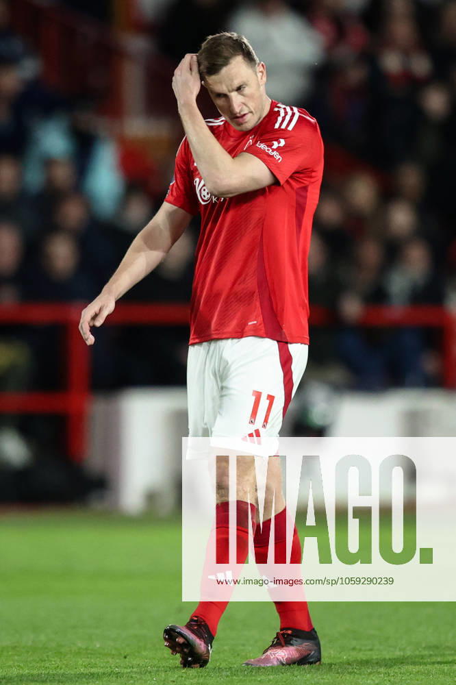 Premier League Nottingham Forest v Arsenal Chris Wood of Nottingham Forest wipes his face during the Premier League match Nottingham Forest vs Arsenal at City Ground, Nottingham, United Kingdom, 26th February 2025 (Photo by Alfie Cosgrove News Images) Nottingham City Ground Nottinghamshire United Kingdom