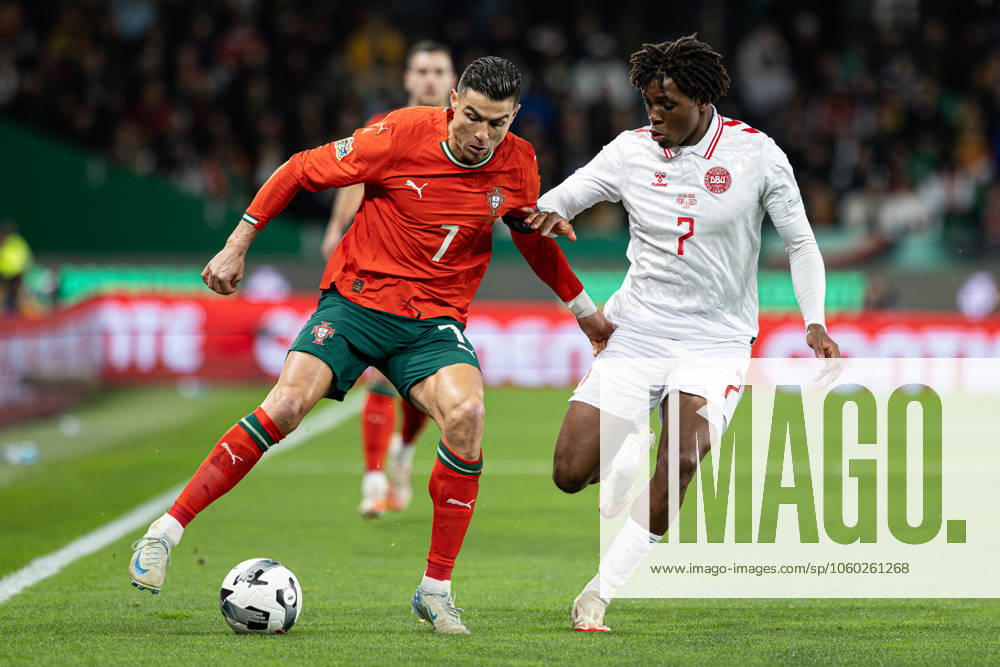 Cristiano Ronaldo of Portugal and Patrick Dorgu of Denmark seen in action during the UEFA Nations League Quarterfinal Leg Two match between Portugal and Denmark at Estadio Jose Alvalade. Lisbon Portugal - ZUMAs197 20250323_aaa_s197_444