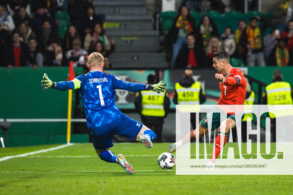 Cristiano Ronaldo of Portugal (R) and goalkeeper Kasper Schmeichel of Denmark (L) during the UEFA Nations League Quarterfinal Leg Two match between Portugal and Denmark at Estadio Jose Alvalade. Lisbon Portugal - ZUMAs197 20250323_aaa_s197_526