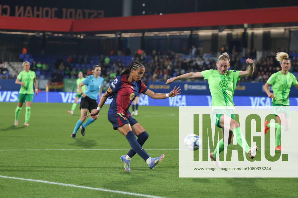 Spain - UEFA Women s Champions League - FC Barcelona, Barca vs VfL Wolfsburg - 27 03 2025 SPAIN, BARCELONA, MARCH 27. Vicky Lopez of FC Barcelona kicks the ball under pressure from Sarai Linder of Wolfsburg during the UEFA Women s Champions League quarterfinals second leg match between FC Barcelona and VfL Wolfsburg on March 27, 2024 at Estadi Johan Cruyff in Barcelona, Spain. Photo by Manuel Blondeau AOP.Press Barcelona Estadi Johan Cruyff Catalunya Spain