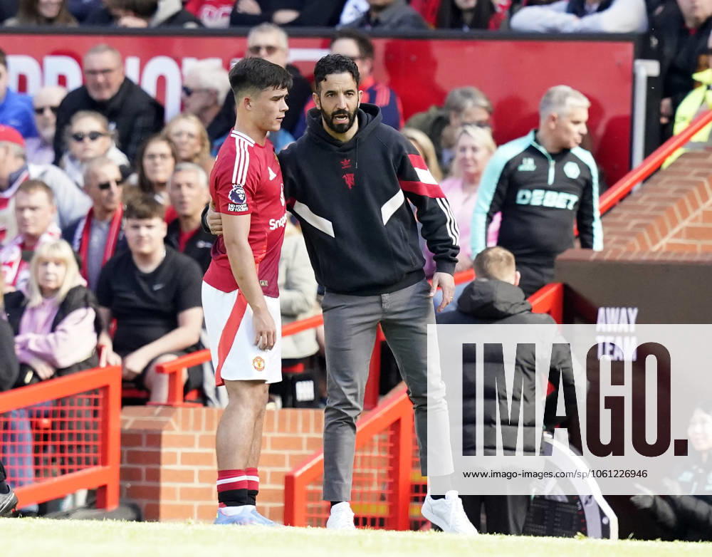 Manchester, England, 20th April 2025. Harry Amass of Manchester United, ManU (L) talks to Ruben Amorim manager of Manchester United during the Manchester United vs Wolverhampton Wanderers Premier League match at Old Trafford, Manchester. Picture credit should read: Andrew Yates Sportimage . SPI_055_AY_MAN_UTD_WOLVES SPI-3852-0043