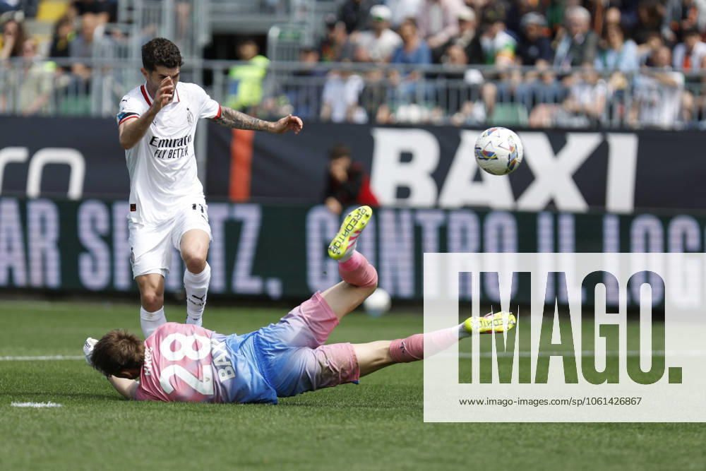 CALCIO - Serie A - Venezia FC vs AC Milan AC Milan s CHRISTIAN PULISIC in action against Venezia s IONUT RADU during the Italian Serie A Enilive soccer championship football match between Venezia FC and AC Milan at Pierluigi Penzo Stadium on April 27th, 2025, Venezia, Italy during Venezia FC vs AC Milan, Italian soccer Serie A match in Venice, Italy, April 27 2025 Venice Italy