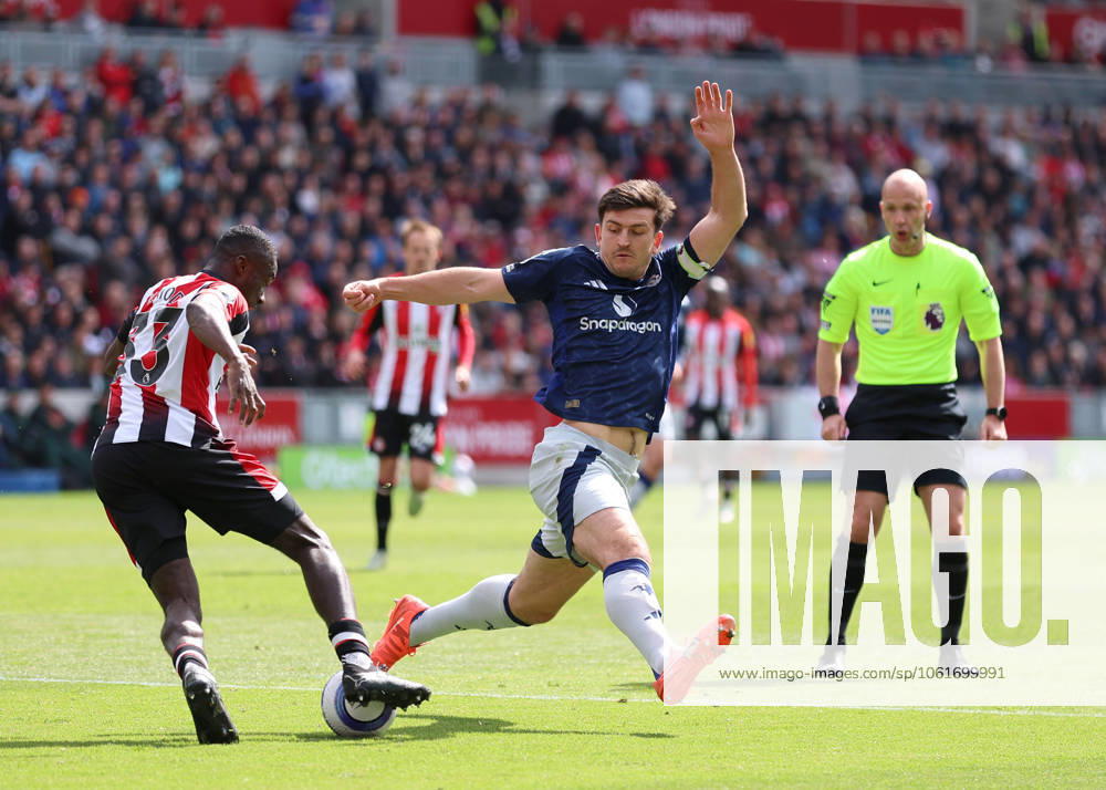 4th May 2025; Gtech Community Stadium, Brentford, London, England; Premier League Football, Brentford versus Manchester United, ManU Harry Maguire of Manchester United loses the ball to Michael Kayode of Brentford ActionPlus12782248 JohnxPatrickxFletcher