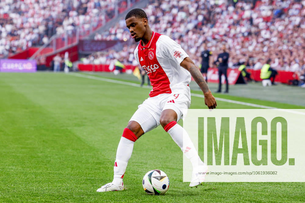Jorrel Hato of Ajax dribbles with the ball , Eredivisie, AFC Ajax v NEC Nijmegen, Johan Cruijff ArenA, May 11, 2025, Amsterdam, Netherlands.