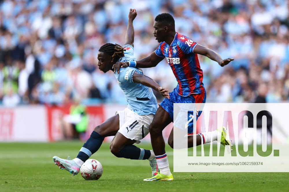 Crystal Palace v Manchester City 17 May 2025, London - FA Cup Final - Crystal Palace v Manchester City - Jeremy Doku of Manchester City and Ismaila Sarr of Crystal Palace - Photo: Jacques Feeney Offside. London UK