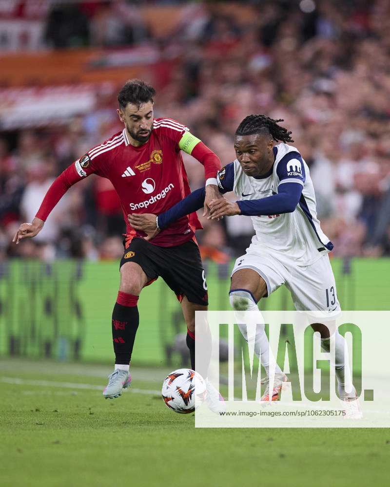 Tottenham Hotspur v Manchester United, ManU - UEFA Europa League Final 2025 Bruno Fernandes of Manchester United competes for the ball with Destiny Udogie of Tottenham Hotspur FC during the UEFA Europa League 2024 25 Final match between Tottenham Hotspur and Manchester United at San Mames on May 21, 2025, in Bilbao, Spain. Bilbao San Mames Basque Country Spain RL_TOTvMUTD_ELF_000082