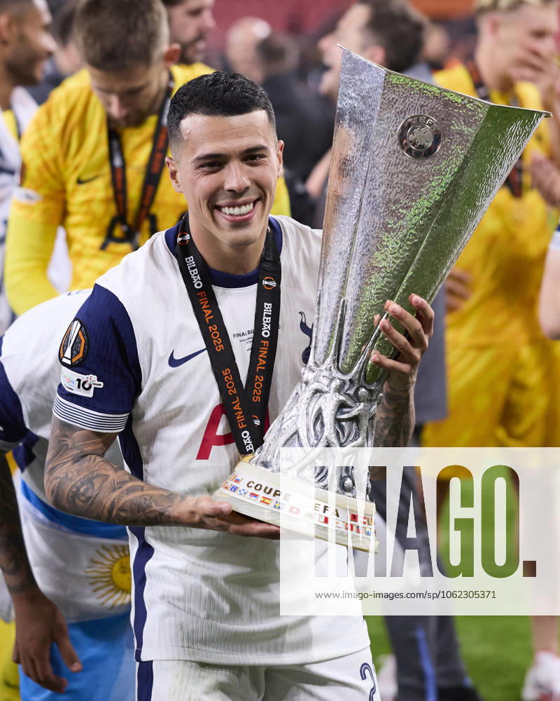Tottenham Hotspur v Manchester United, ManU - UEFA Europa League Final 2025 Pedro Porro of Tottenham Hotspur FC lifts the trophy during the UEFA Europa League 2024 25 Final match between Tottenham Hotspur and Manchester United at San Mames on May 21, 2025, in Bilbao, Spain. Bilbao San Mames Basque Country Spain RL_TOTvMUTD_ELF_000234