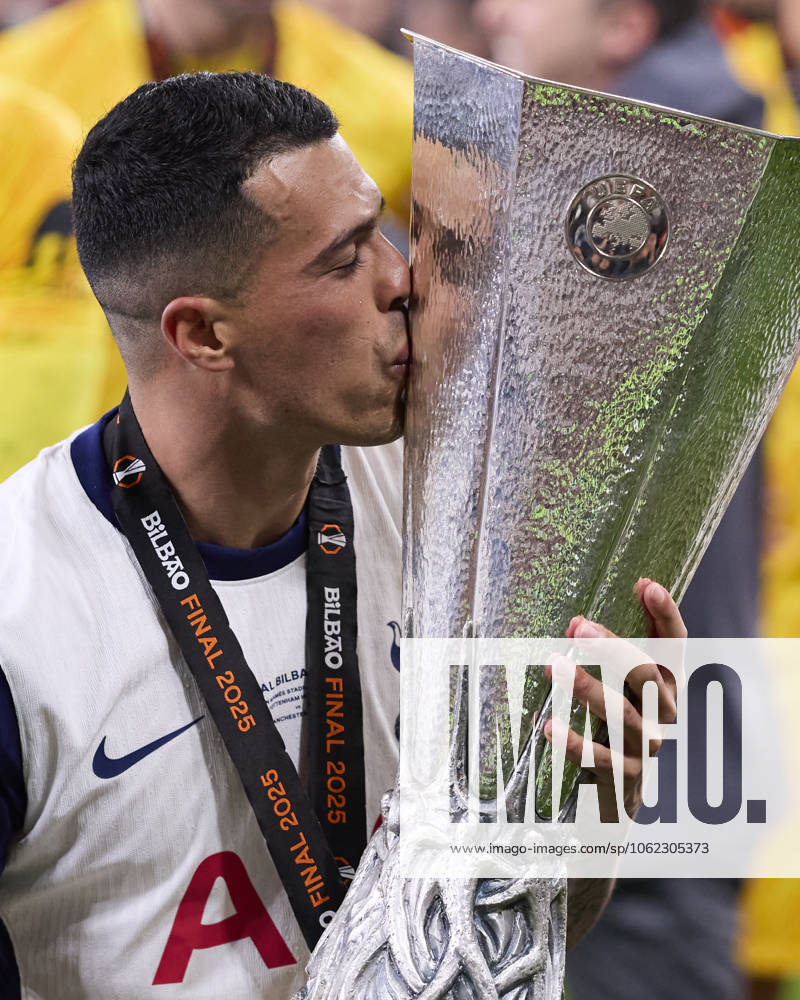 Tottenham Hotspur v Manchester United, ManU - UEFA Europa League Final 2025 Pedro Porro of Tottenham Hotspur FC kiss the trophy during the UEFA Europa League 2024 25 Final match between Tottenham Hotspur and Manchester United at San Mames on May 21, 2025, in Bilbao, Spain. Bilbao San Mames Basque Country Spain RL_TOTvMUTD_ELF_000236