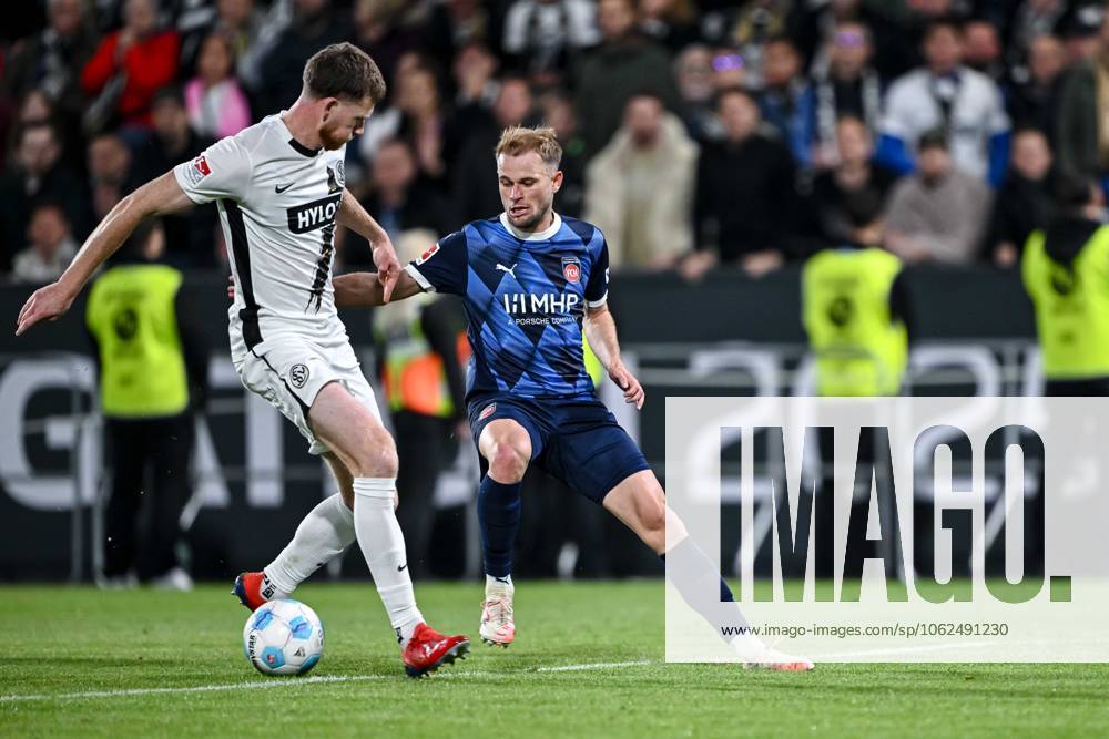 Florian Le Joncour (SV Elversberg) und Leonardo Scienza (1.FC Heidenheim) im Zweikampf während des Bundesliga-Relegationsrückspiels zwischen der SV Elversberg und dem 1.FC Heidenheim, URSAPHARM-ARENA am 26. May 2025 in Elverberg, Deutschland. (Foto von Harry Langer DeFodi Images) +++ Florian Le Joncour (SV Elversberg) und Leonardo Scienza (1.FC Heidenheim) battle for the ball during the Bundesliga relegation second leg match between SV Elversberg and 1.FC Heidenheim at URSAPHARM-ARENA on May 26, 2025 in Elverberg, Germany. (Photo by Harry Langer DeFodi Images) DFL regulations prohibit any use of photographs as image sequences and or quasi-video. (Photo by Harry Langer DeFodi Images) DFL regulations prohibit any use of photographs as image sequences and or quasi-video.