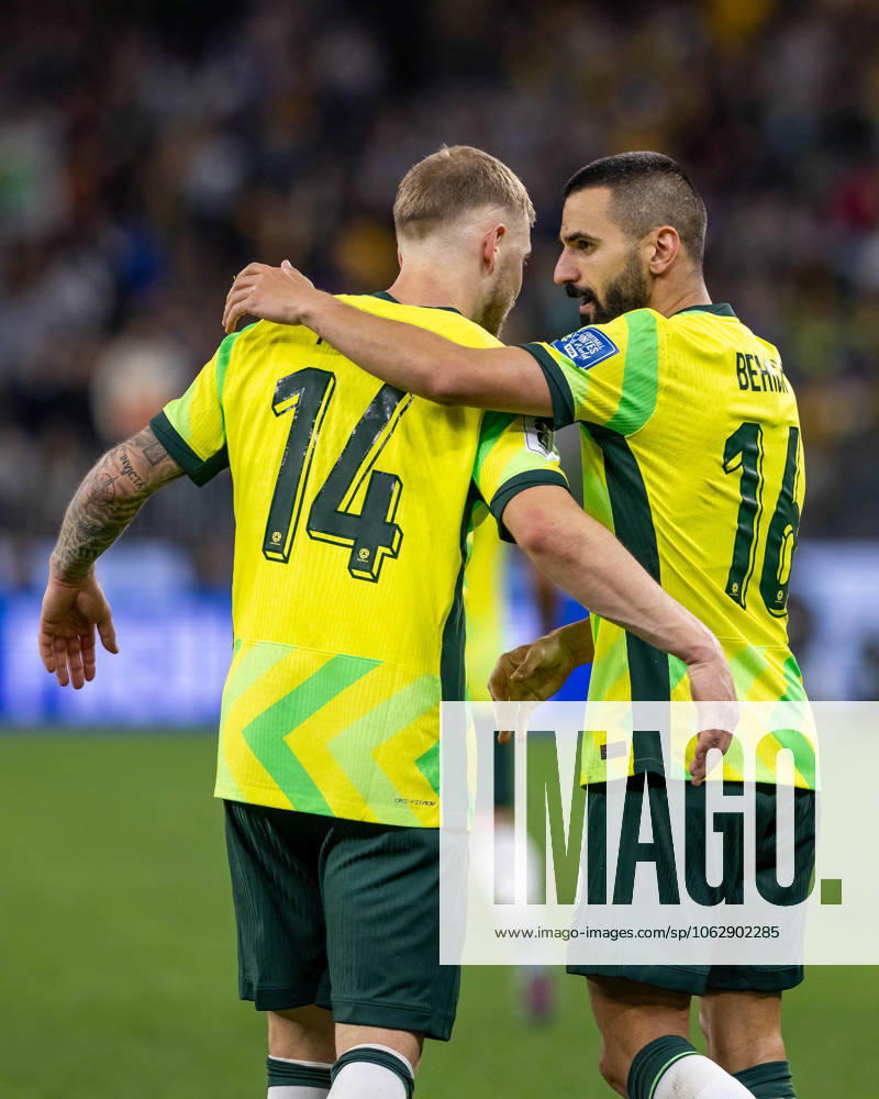 Perth, Australia, June 5th 2025: Riley Mcgree (14 Australia) hugs with Aziz Behich (16 Australia) after scoring the winning goal during the FIFA World Cup, WM, Weltmeisterschaft, Fussball 26â ¢ AFC Qualifiers game between Australia and Japan at Optus Stadium in Perth, Australia. (Ramiro Larguia SPP)
