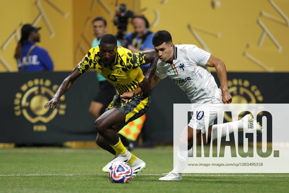 Atlanta, USA, 1st July 2025. Serhou Guirassy of Borussia Dortmund battles for possession with Jorge Rodriguez of CF Monterrey during the Borussia Dortmund vs CF Monterrey FIFA Club World Cup match at Mercedes Benz Stadium, Atlanta. Picture credit should read: Jonathan Moscrop Sportimage . SPI_097_JM_BORUSSIA_MONTERREY_ SPI-3997-0097