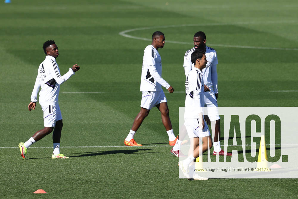 Vinicius Junior of Real Madrid talks to Antonio Rudiger during the training day celebrated at Ciudad Deportiva Real Madrid on October 01, 2022, in Valdebebas, Madrid, Spain.