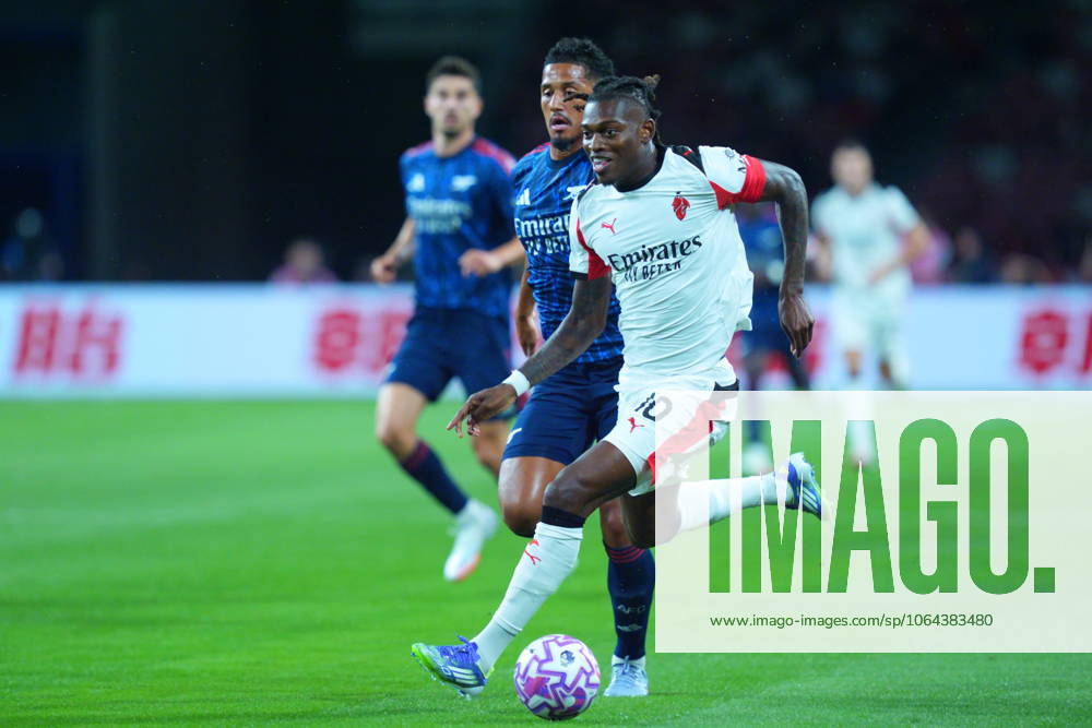 Arsenal FC V AC Milan - Pre-Season Friendly Match Rafael Leao of AC Milan dribbles past William Saliba of Arsenal during the pre-season friendly match between Arsenal FC and AC Milan at National Stadium in Singapore on July 23, 2025. Singapore Singapore