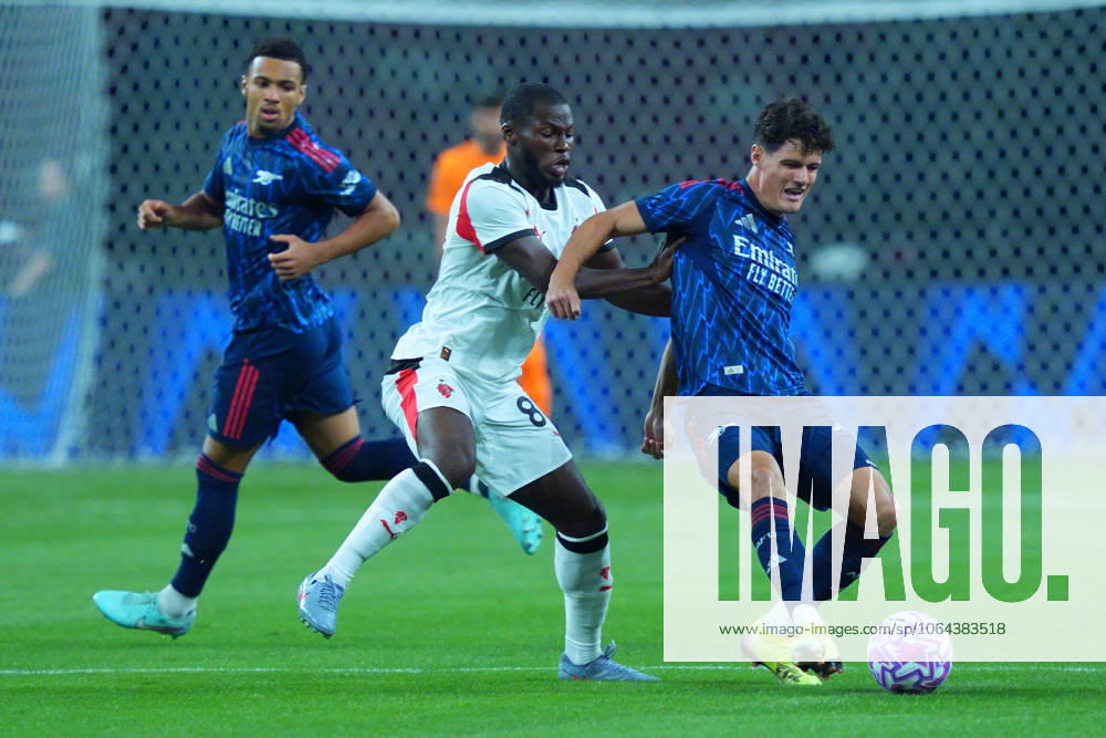 Arsenal FC V AC Milan - Pre-Season Friendly Match Yunus Musah of AC Milan challenges Christian Norgaard of Arsenal for the ball during the pre-season friendly match between Arsenal FC and AC Milan at National Stadium in Singapore on July 23, 2025. Singapore Singapore