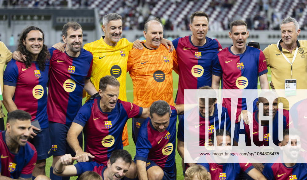 Legends of El Clasico: Real Madrid v Barcelona DOHA, QATAR - NOV 28: Barcelona s legends pose for a picture with the trophy after winning the Legends El Clasico football match between Real Madrid and Barcelona at the Khalifa International Stadium in Doha, Qatar on November 28, 2024. Doha Qatar. Editorial use only. Please get in touch for any other usage.