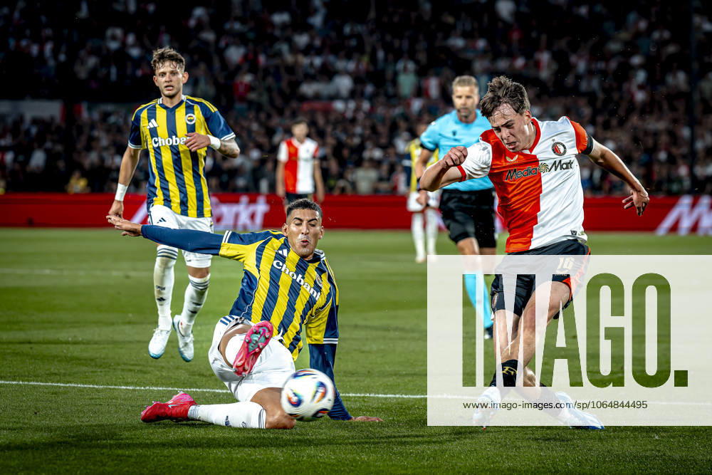 Fenerbahce SK defender Mert Muldur, Feyenoord Rotterdam forwarder Leo Sauer during the match Feyenoord - Fenerbahce at the Kuip Stadium for the third qualifying round champions league season 2025-2026 in Rotterdam, Netherlands on 6 august 2025, (photo by Marcel van Dorst EYE4images DeFodi Images)