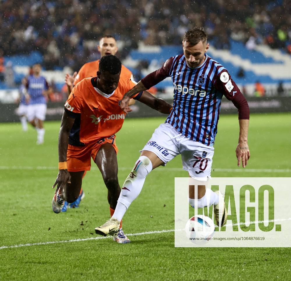 Trabzonspor v Basaksehir - Turkish Super Lig TRABZON, TURKIYE - OCTOBER 19: Denis Dragus (R) of Trabzonspor in action during the Turkish Super Lig week 9th match between Trabzonspor and Basaksehir at Papara Park in Trabzon, Turkiye on October 19, 2024. Trabzon Turkey. Editorial use only. Please get in touch for any other usage.