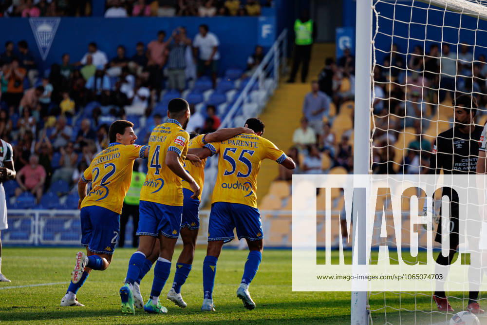 Players of Estoril seen celebrating after goal from Tiago Parente during Liga Portugal game between teams of GD Estoril Praia and CF Estrela Amadora (Maciej Rogowski) Estoril Estadio Antonio Coimbra da Mota Portugal