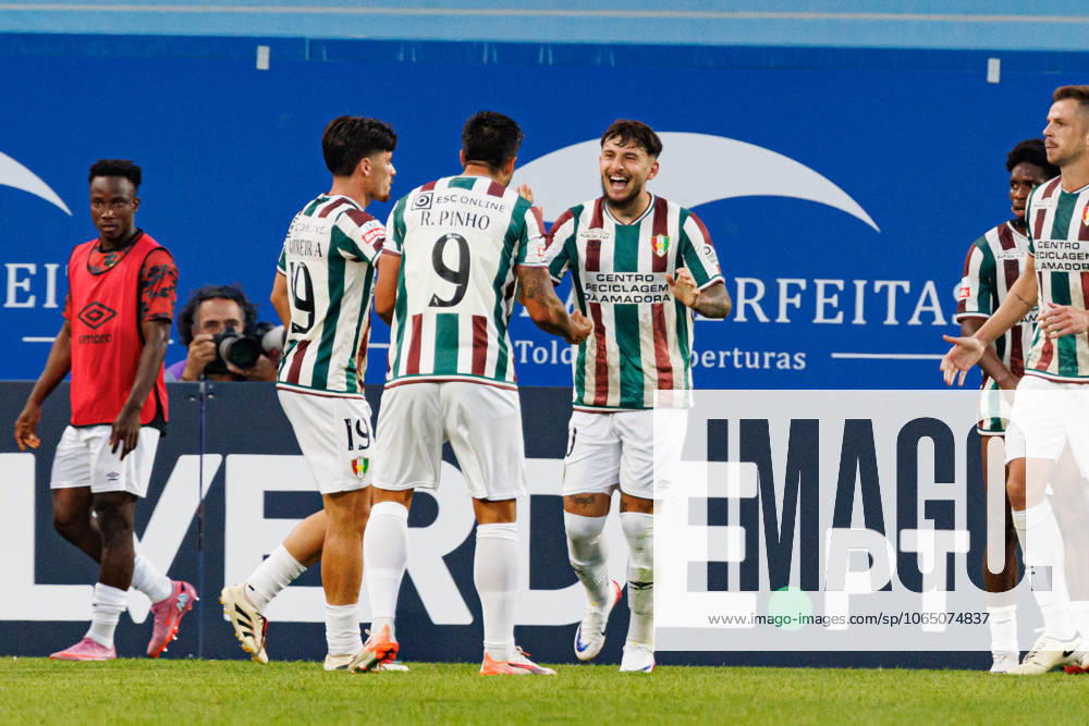 Players of Estrela seen celebrating after goal from Ianis Stoica during Liga Portugal game between teams of GD Estoril Praia and CF Estrela Amadora (Maciej Rogowski) Estoril Estadio Antonio Coimbra da Mota Portugal