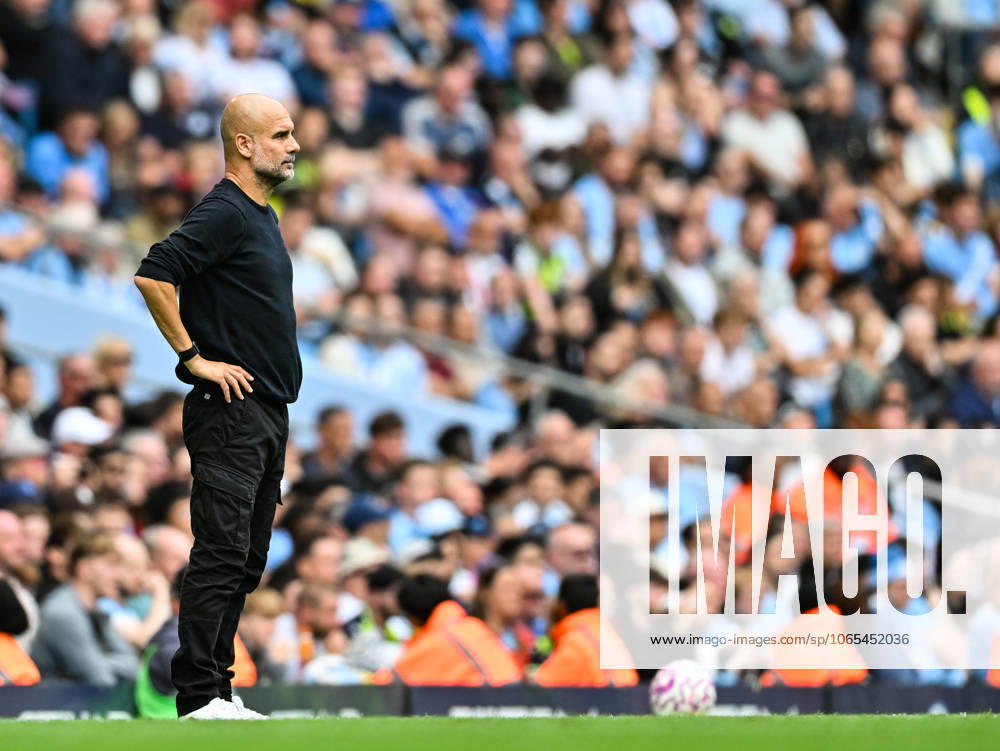23rd August 2025; Etihad Stadium, Manchester, England; Premier League Football, Manchester City versus Tottenham Hotspur; Manchester City Manager Pep Guardiola watches play GodfreyxPitt Content restricted for UK based newspaper
