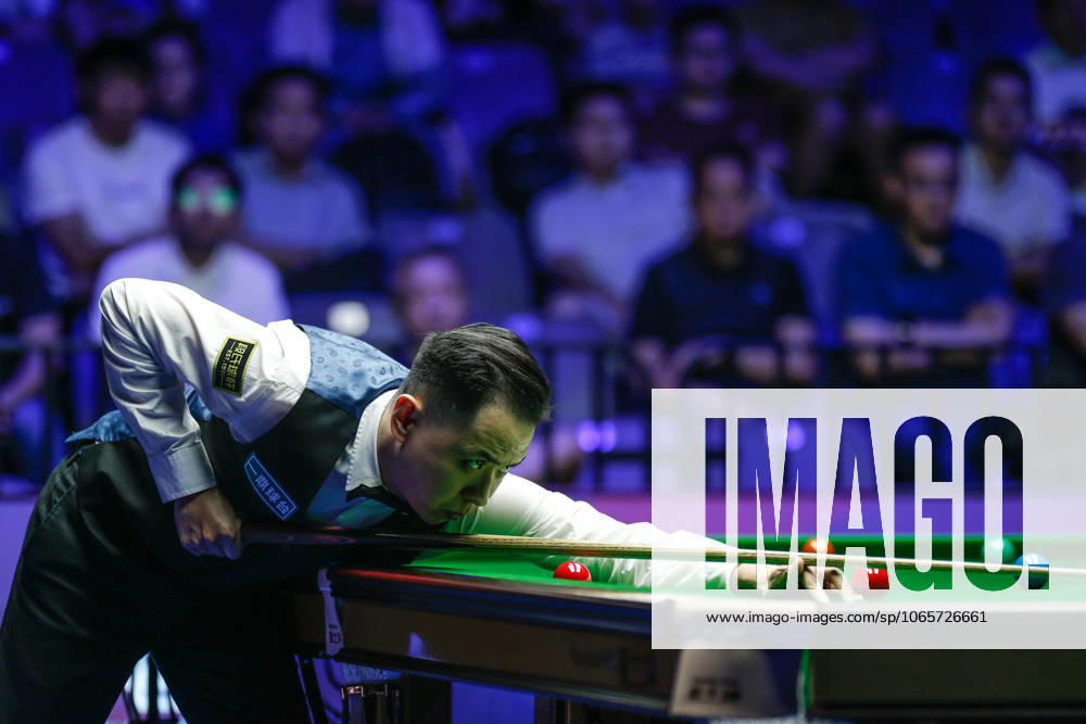Xiao Guodong of China plays a shot in the Semifinal match against Mark J Williams of Wales on day 6 of the 2025 Wuhan Open at Optics Valley Gymnasium of HUST on August 29, 2025 in Wuhan, Hubei Province of China.