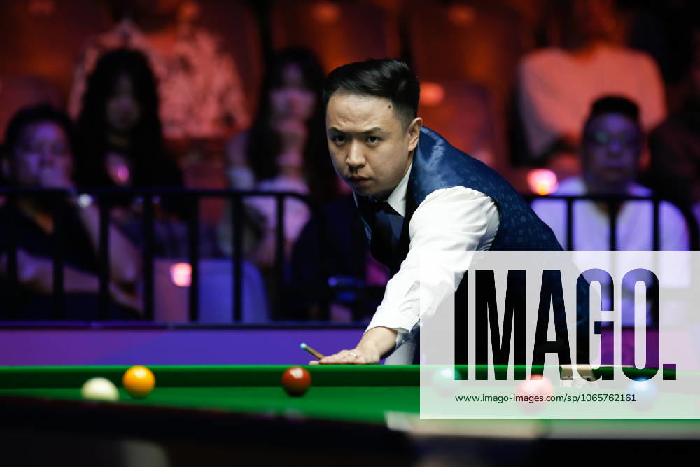 Xiao Guodong of China plays a shot in the Final match against Gary Wilson of England on day 7 of the 2025 Wuhan Open at Optics Valley Gymnasium of HUST on August 30, 2025 in Wuhan, Hubei Province of China.