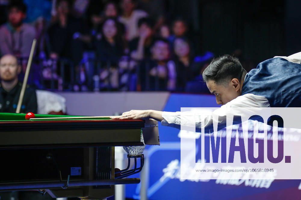 Xiao Guodong of China plays a shot in the Final match against Gary Wilson of England on day 7 of the 2025 Wuhan Open at Optics Valley Gymnasium of HUST on August 30, 2025 in Wuhan, Hubei Province of China.