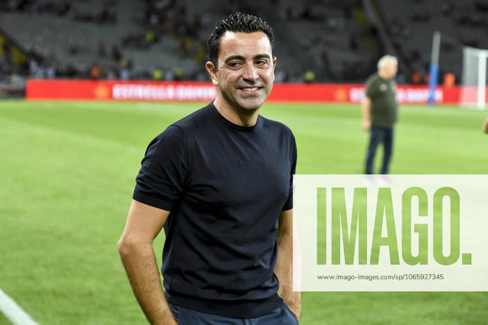 FC Barcelona, Barca v Tottenham - 58th Joan Gamper Trophy BARCELONA, SPAIN - AUGUST 08: Xavi Hernandez (R), head coach of Barcelona follows the 58th Joan Gamper Trophy match between Barcelona and Tottenham Hotspur FC at the Lluis Companys Olympic Stadium on August 08, 2023. Spain World. Editorial use only. Please get in touch for any other usage.