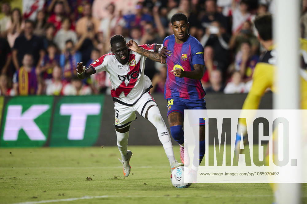 Rayo Vallecano v FC Barcelona, Barca - LaLiga EA Sports MADRID, SPAIN - AUGUST 31: Marcus Rashford of FC Barcelona competes for the ball with Pathe Ciss of Rayo Vallecano during to the LaLiga EA Sports match between Rayo Vallecano and FC Barcelona at Campo de Futbol de Vallecas on August 31, 2025 in Madrid, Spain. (Photo by Francisco Macia Photo Players Images Magara Press) Madrid Campo de futbol de Vallecas Madrid Spain
