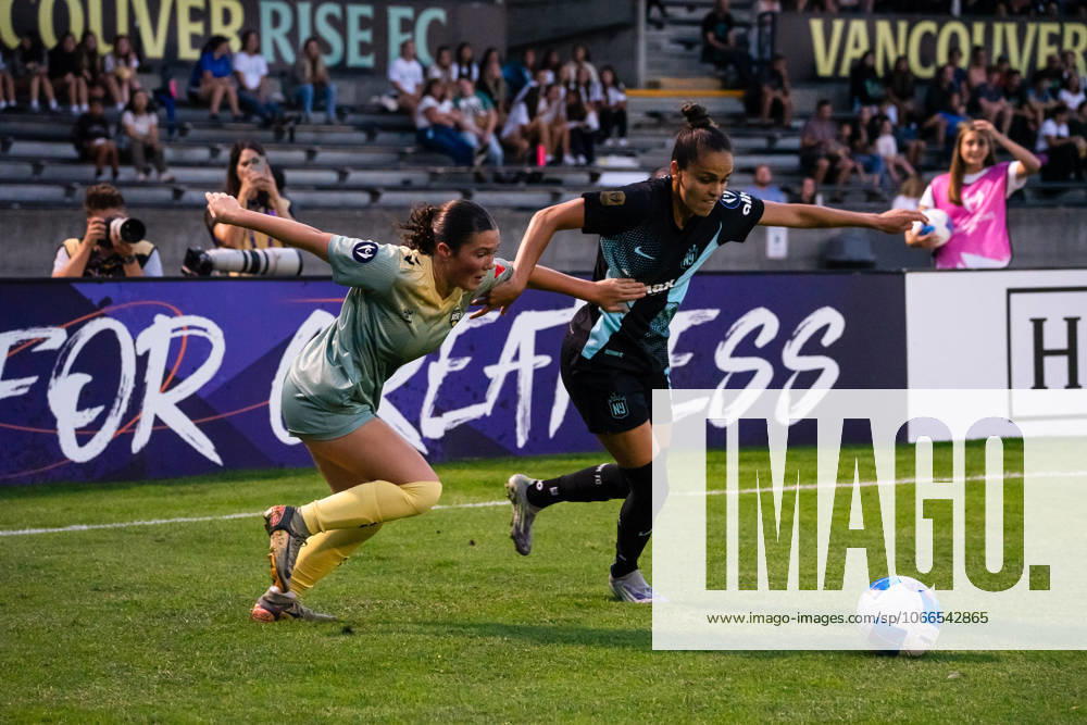 Gabrielle Portilho (18 Gotham FC) and Adri Giese (47 Vancouver Rise FC Academy) battles for the ball during the Concacaf W Champions Cup group stage soccer match between Vancouver Rise FC Academy and Gotham FC at Swangard Stadium in Burnaby, British Columbia, Canada (EDITORIAL USAGE ONLY).